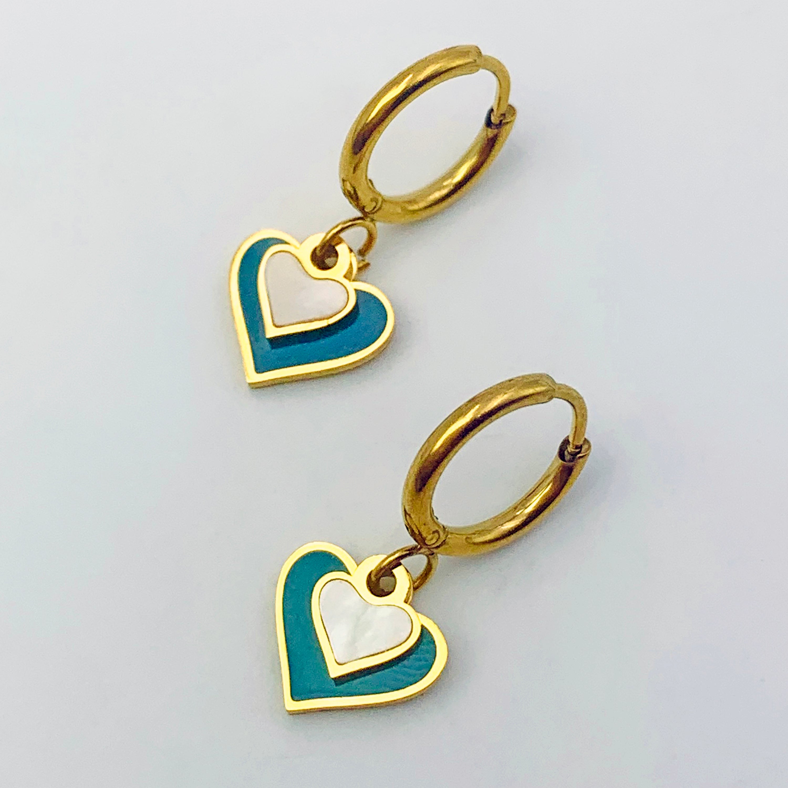 Pendientes colgantes de corazón de dos tonos