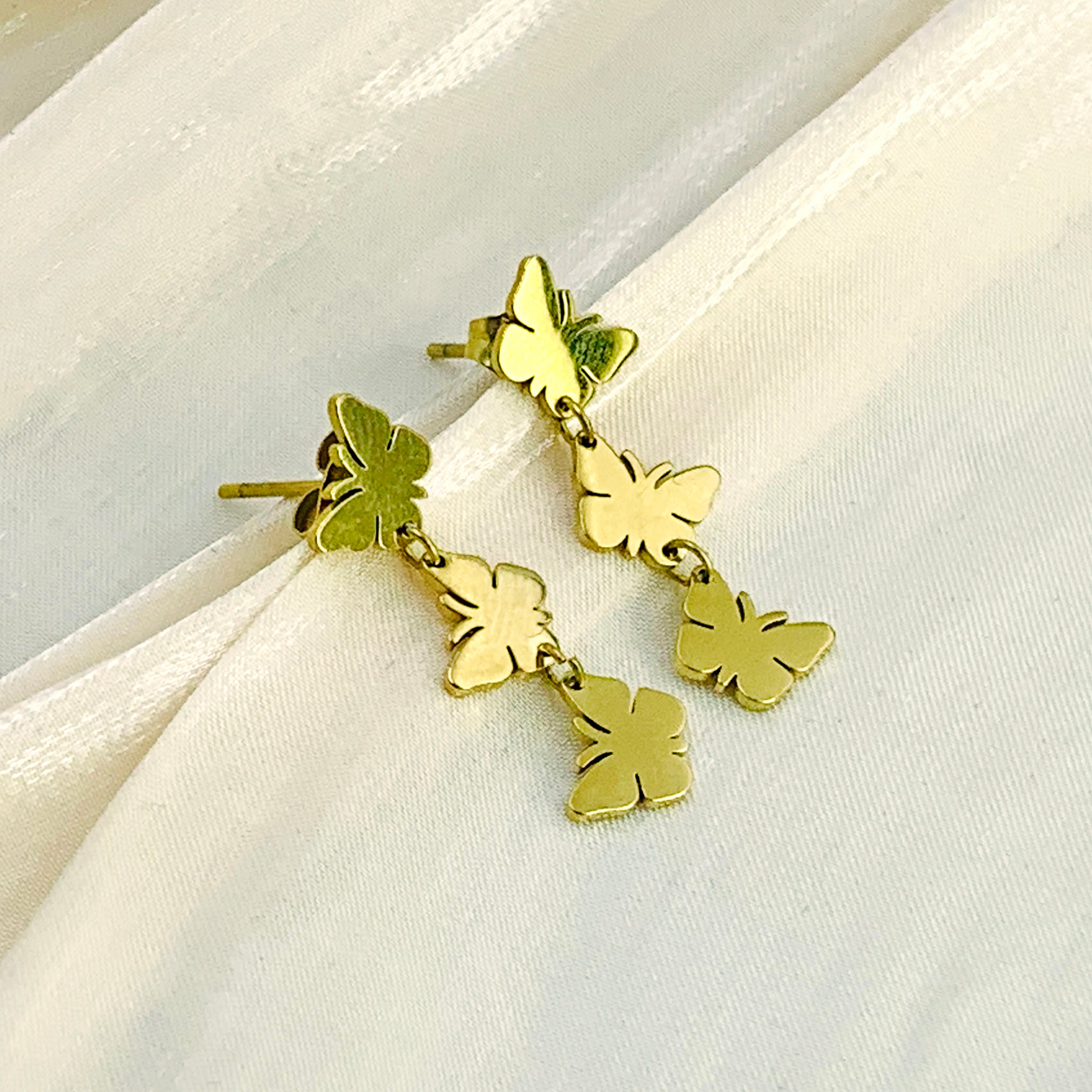 Pendientes de enhebrador divino
