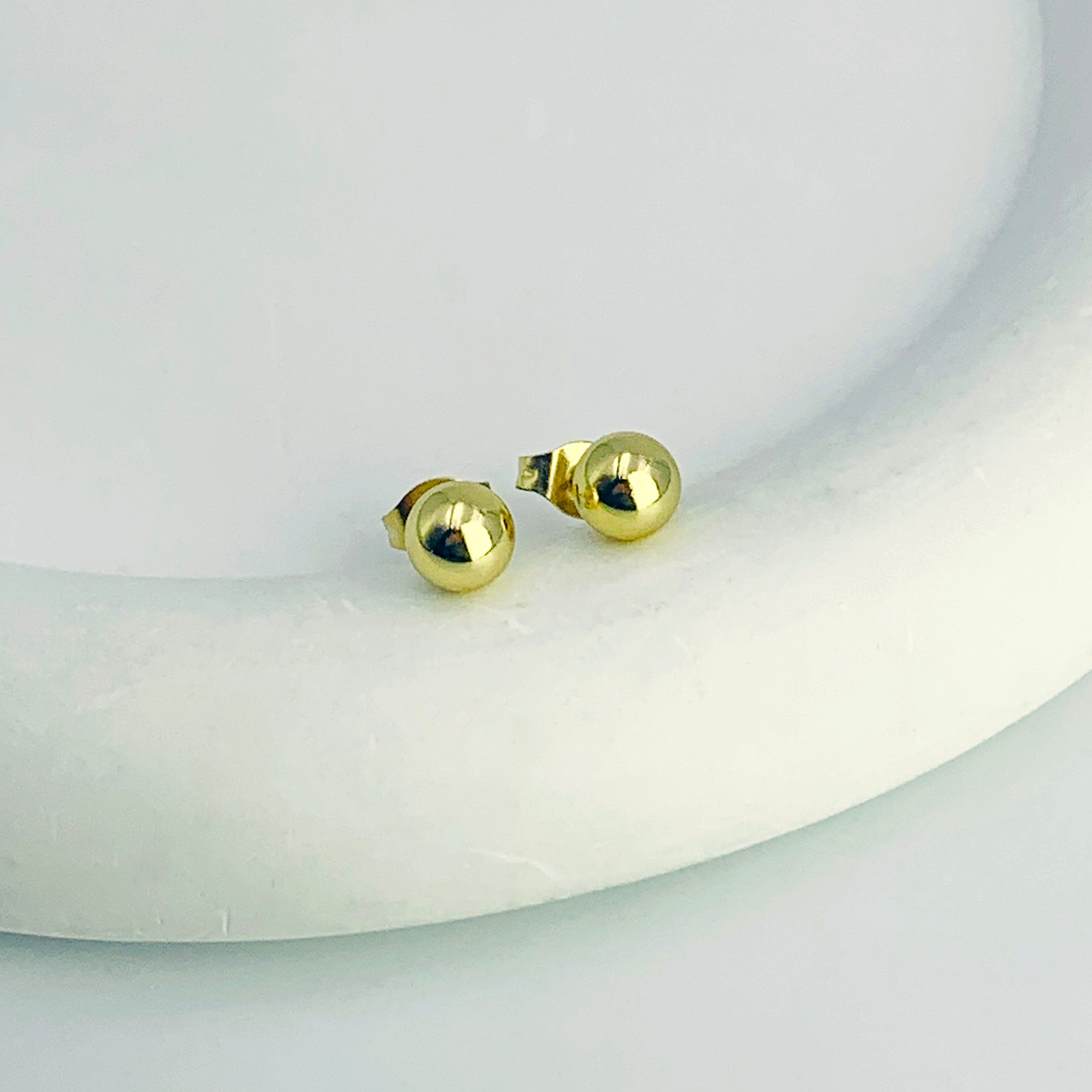 Pendientes de enhebrador divino