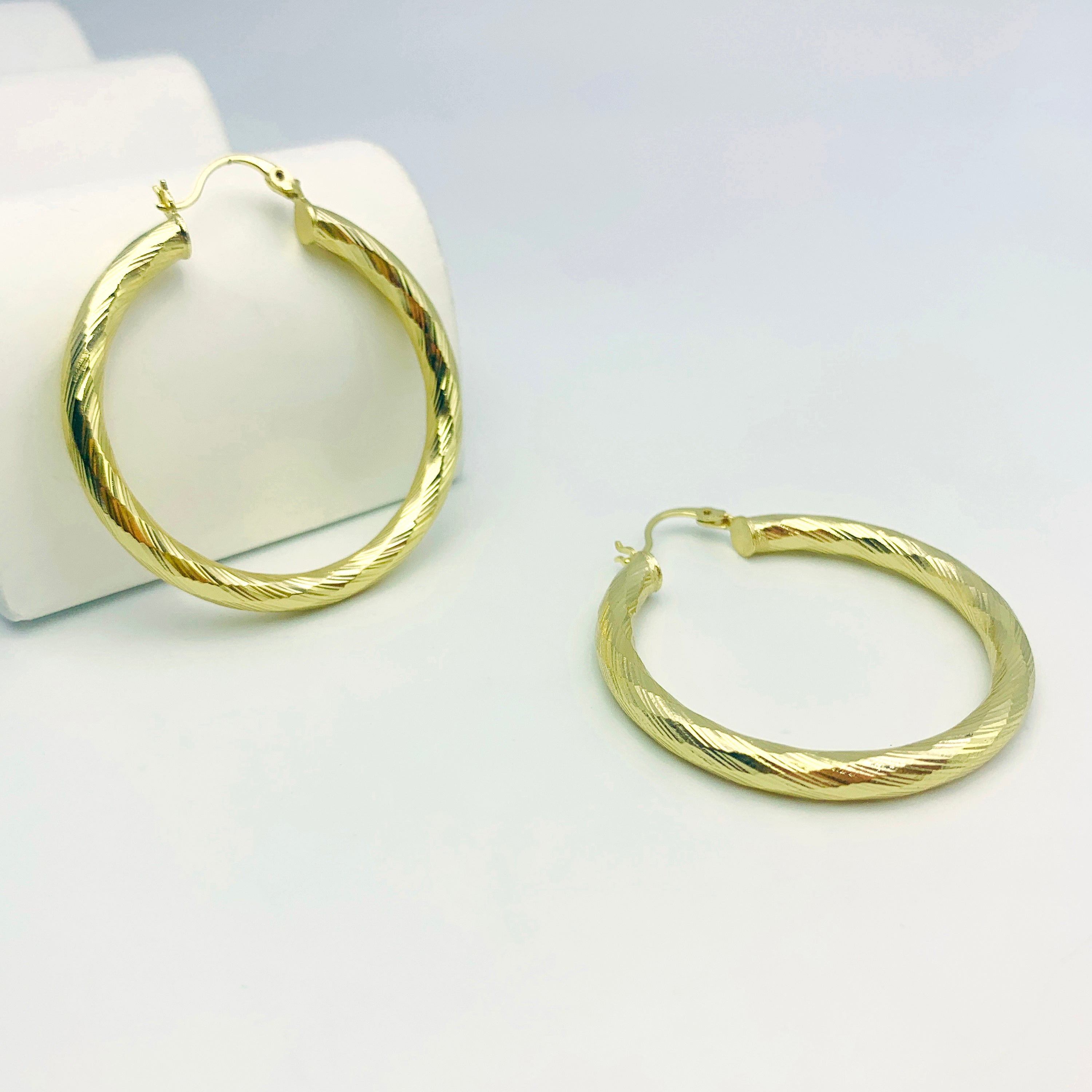 Pendientes de enhebrador divino