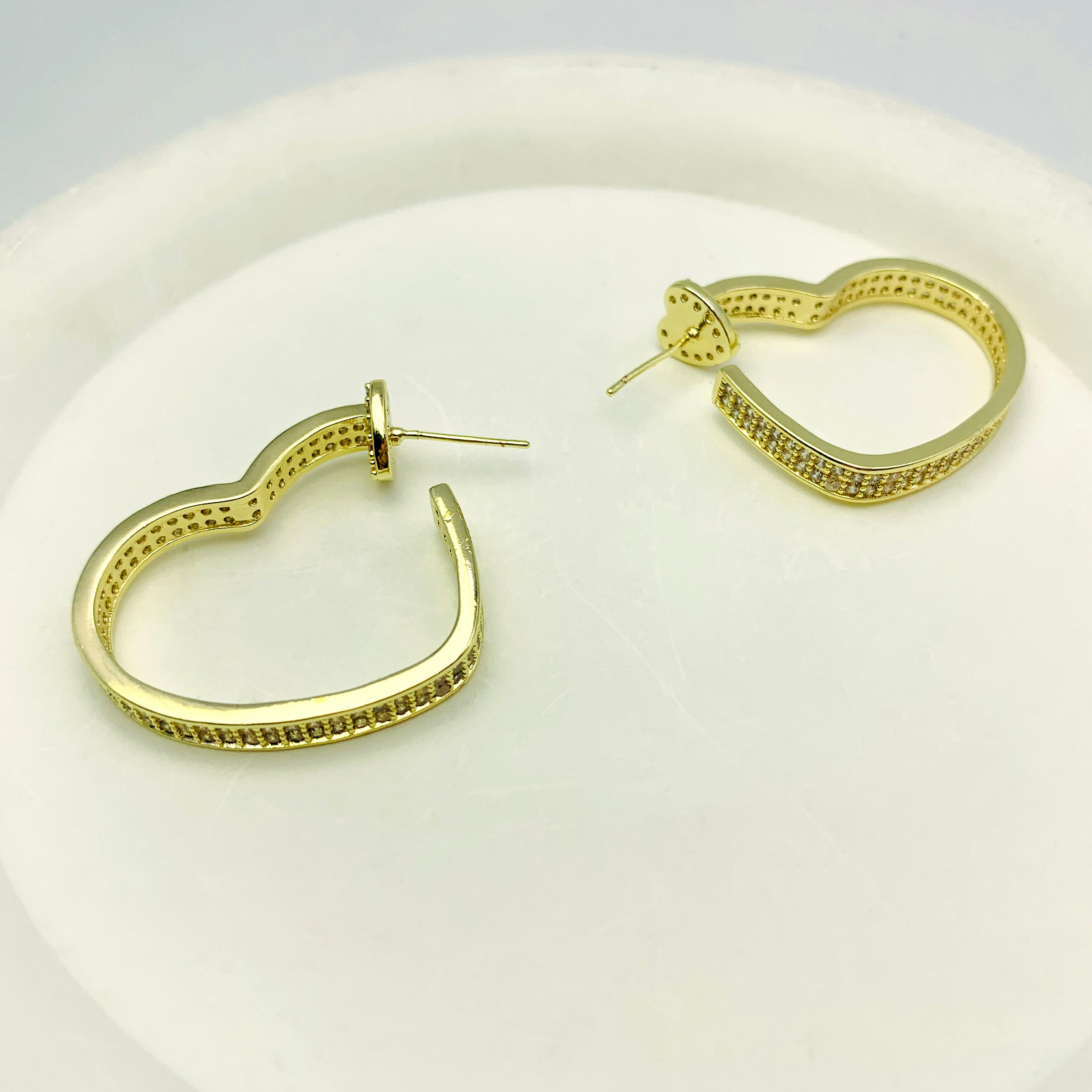 Pendientes de enhebrador divino