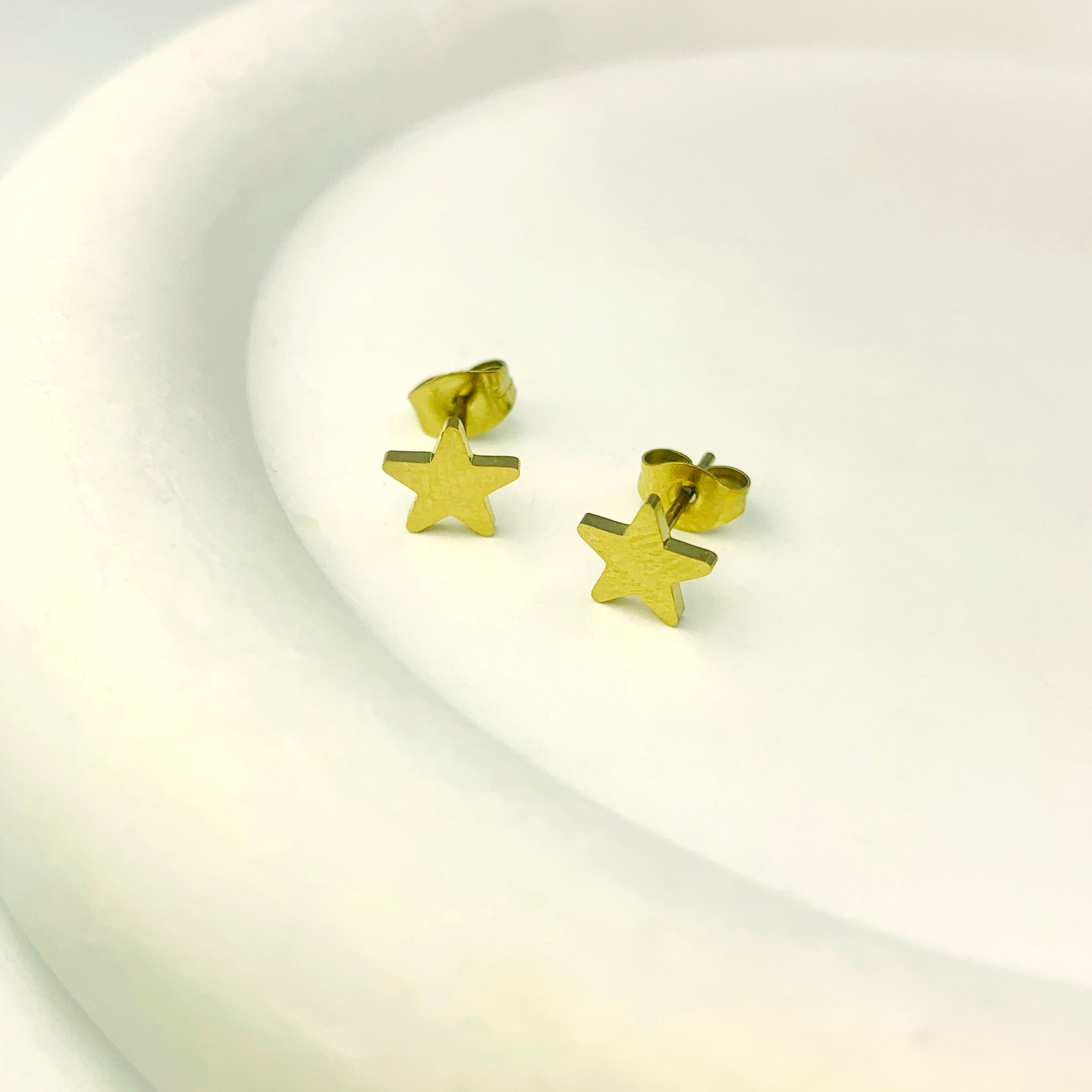 Pendientes de estrella de oro