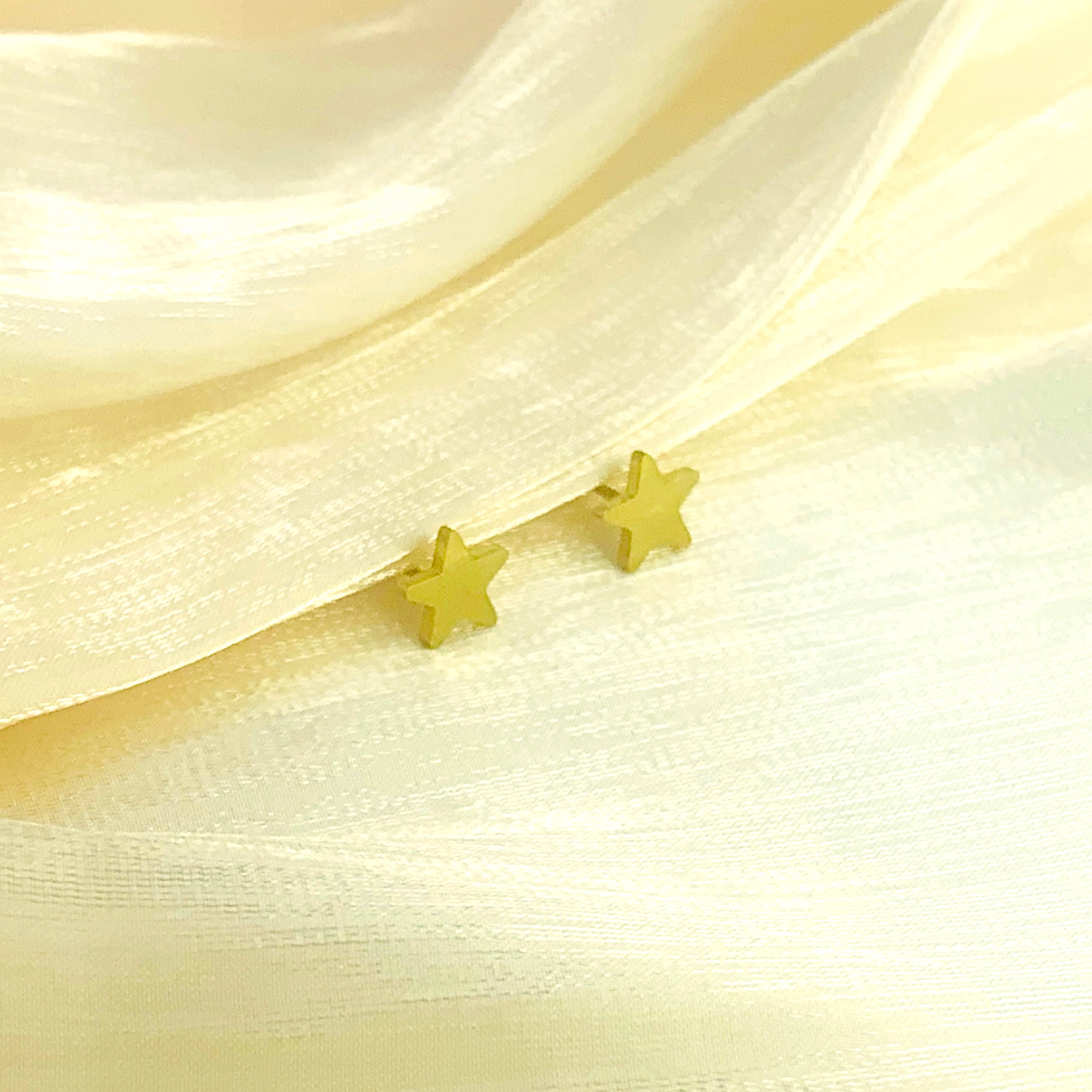 Pendientes de estrella de oro