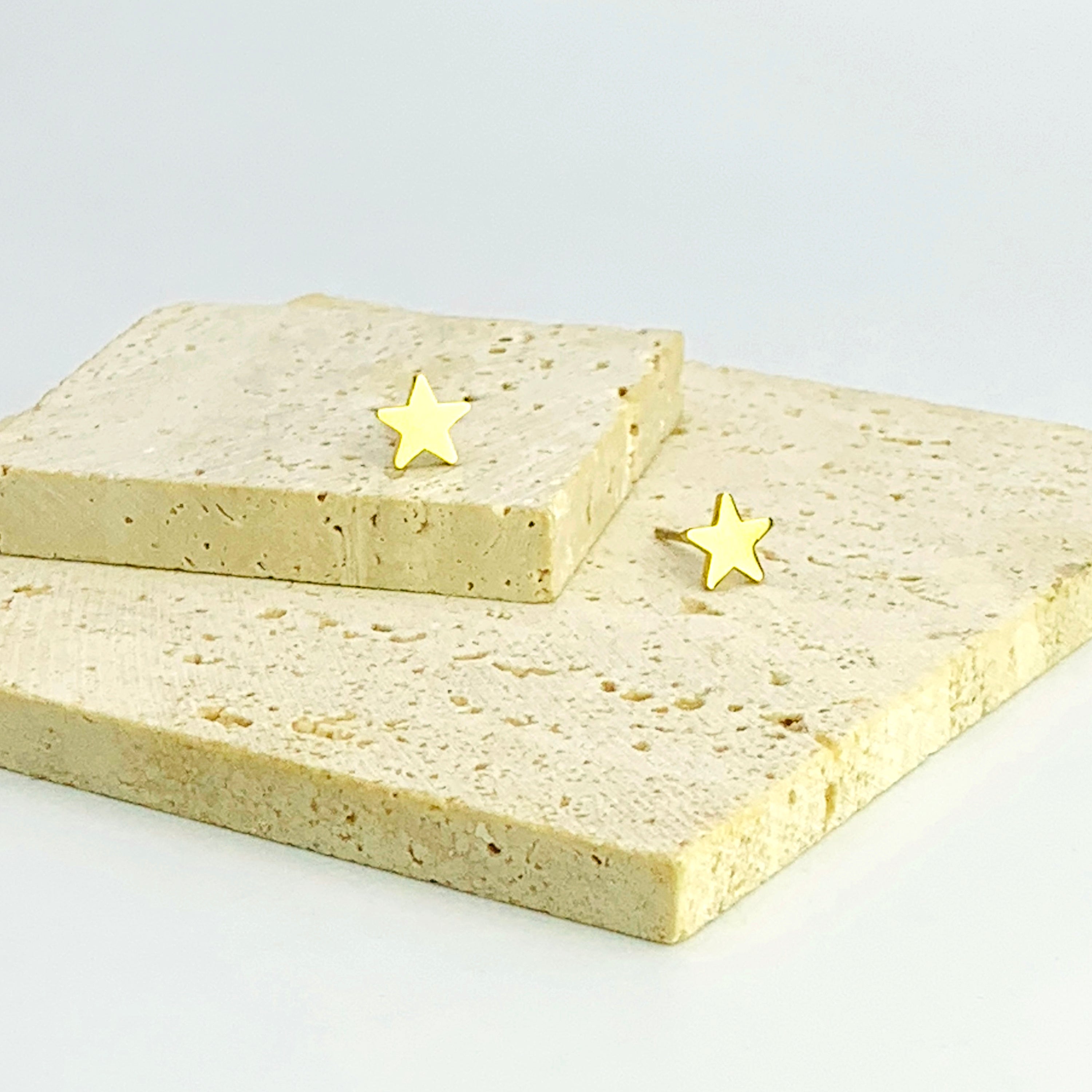 Pendientes de estrella de oro