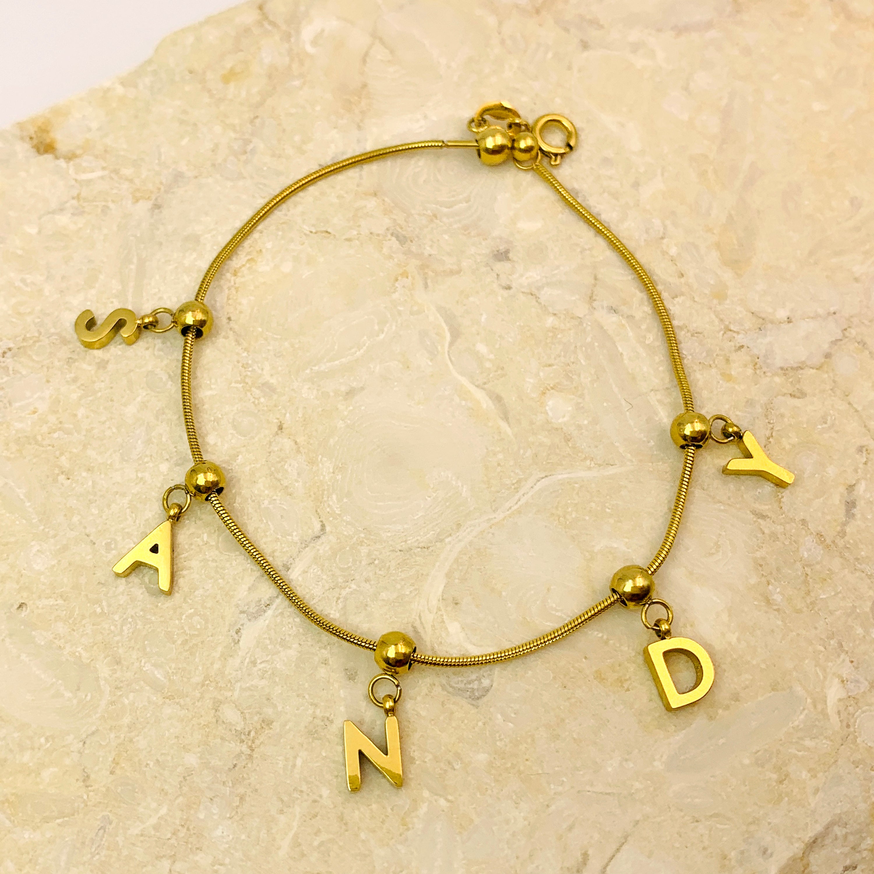 Pulsera con dije y nombre