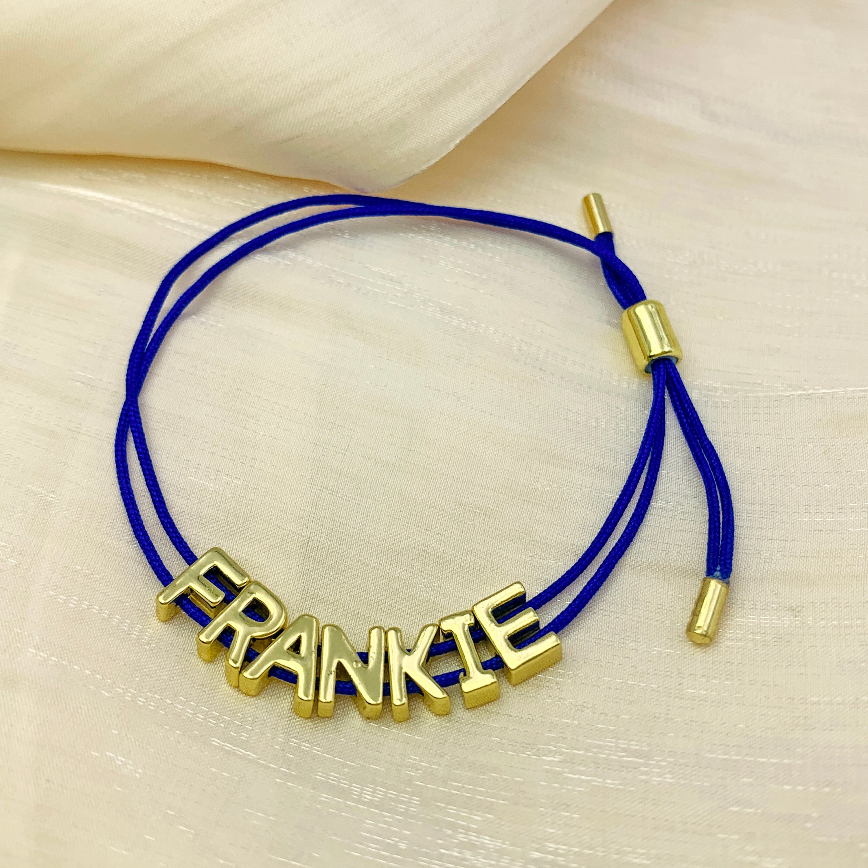 Pulsera personalizada con dijes de cordón