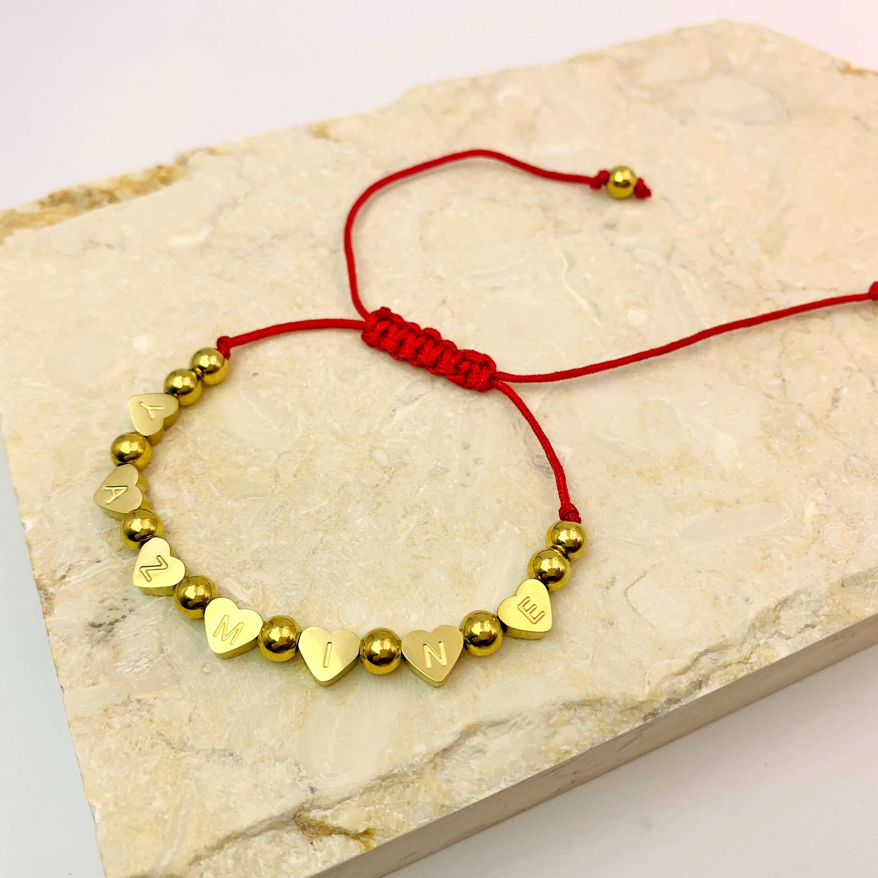 Pulsera de cordón con forma de corazón